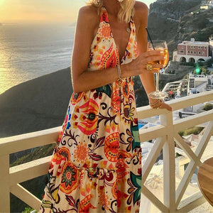 Stylish deep V halterneck sleeveless print resort beach dress
